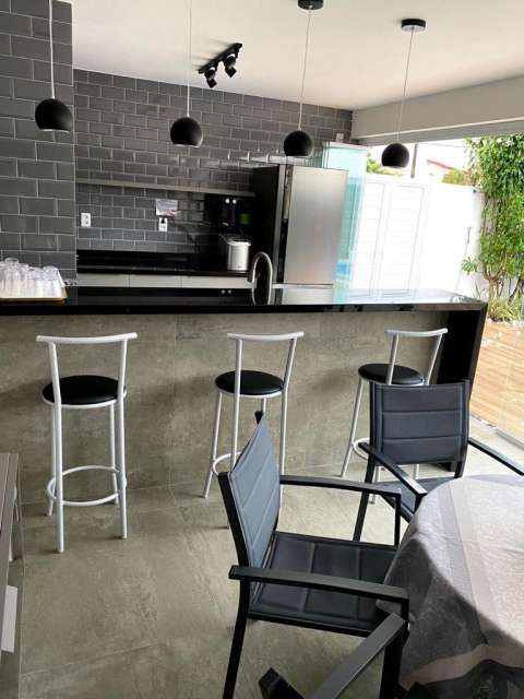 Casa em Guarajuba com 6 suítes, 422m² à venda por R$ 3.750.000,00