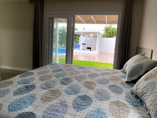 Casa em Guarajuba com 6 suítes, 422m² à venda por R$ 3.750.000,00