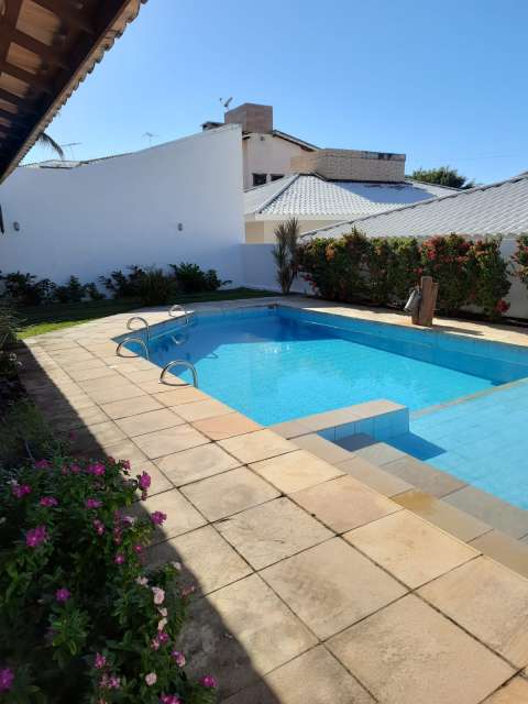 Casa em Vilas do Atlântico com 4 suítes, 317m² à venda por R$ 1.750.000,00