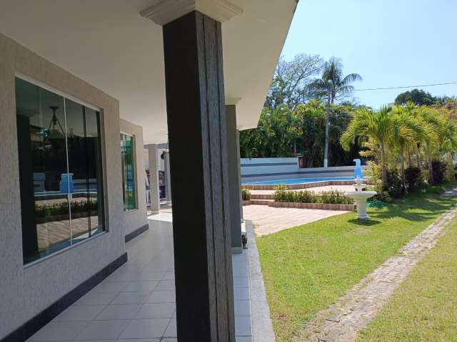 Casa em Vilas do Atlântico com 6 quartos e 4 suítes, 600m² à venda por R$ 2.600.000,00