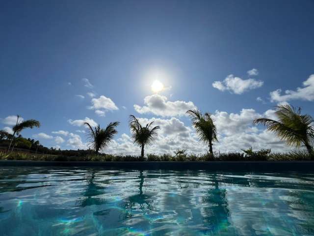 Lote em condomínio no litoral norte com 900,00 m² à venda por R$ 340.000,00 - Mata de São João/Ba