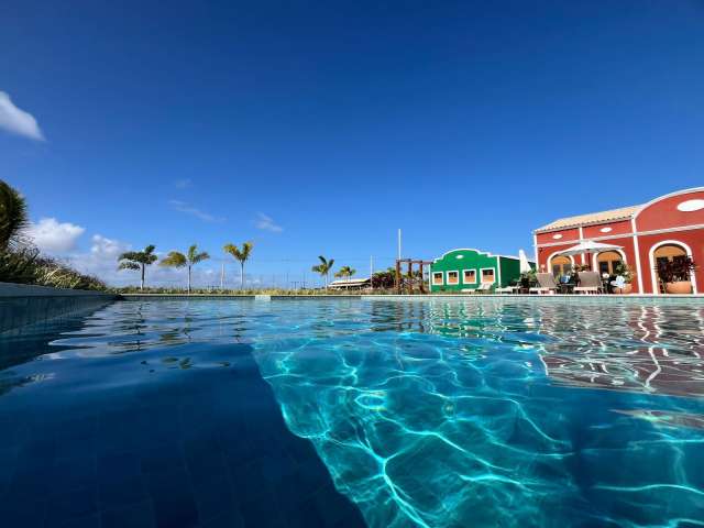 Lote em condomínio no litoral norte com 900,00 m² à venda por R$ 340.000,00 - Mata de São João/Ba