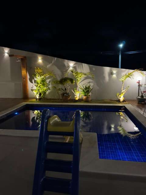 Casa em Alphaville Litoral Norte 3 com 4 suítes, 280m² à venda por R$ 2.370.000,00