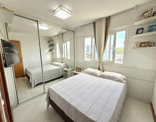 Apartamento em Armação com 2 quartos e 2 suítes, 93,00 m² à venda por R$ 890.000,00